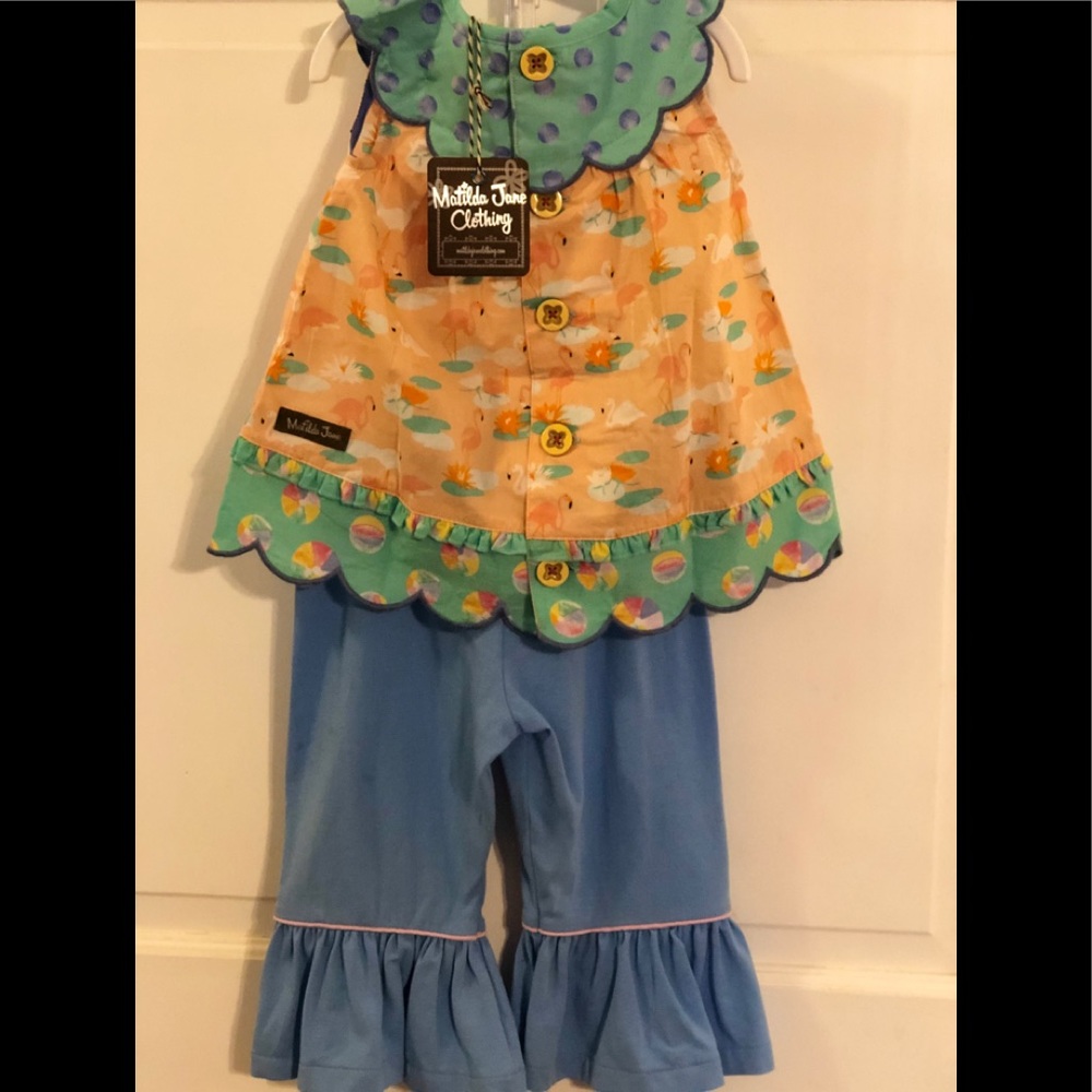 Tunic is new with tag bottoms are new w/o tag